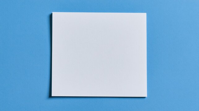 A single square piece of paper rests flat upon a vibrant azure surface providing ample area for adding personalized text or custom graphic elements to enhance the overall aesthetic of your