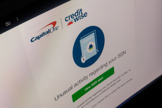 Capital One (COF) CreditWise monitoring unusual activity regarding your social security number alert email on computer screen