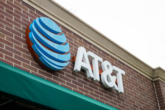 Fort Collins, CO, USA - August 25, 2026: AT&T sign and logo on the facade of a retail store in Fort Collins, Colorado. Telecommunications, wireless and mobile technology company.