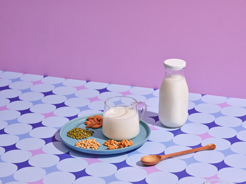 Artistic shot of milk alternatives ingredients like almonds, walnuts