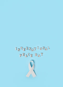 International Day of Peace awareness concept with white symbolic ribbon, representing global peace, unity, harmony, tolerance, nonviolence and peaceful coexistence