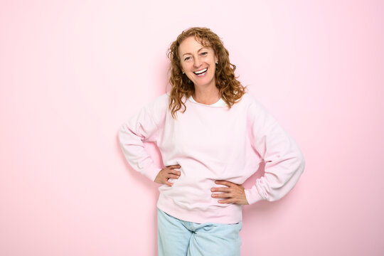 Happy mature woman on studio white background with nice portrait