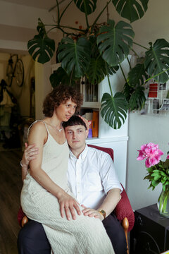 A couple is spending time in room