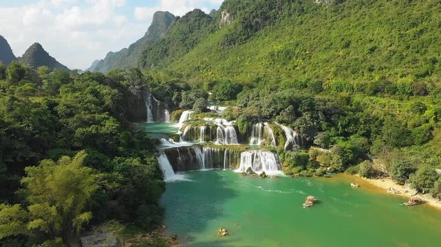 Stunning aerial footage of the Ban Gioc Waterfall, located in Cao Bang province, northern Vietnam. This iconic landmark is a popular travel destination on the border between Vietnam and China.