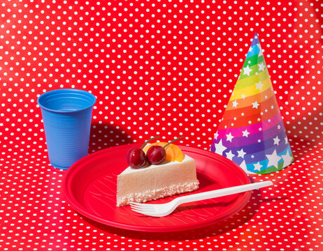 Piece of Birthday Cake with Party Hat and Accessories
