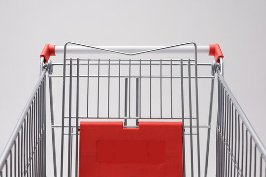 Empty Metal Shopping Cart Symmetrical Front View with Red Details