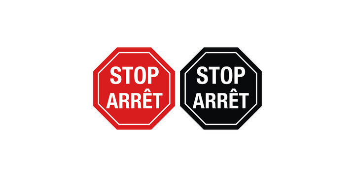 Stop and arret bilingual octagonal road signs in red and black.