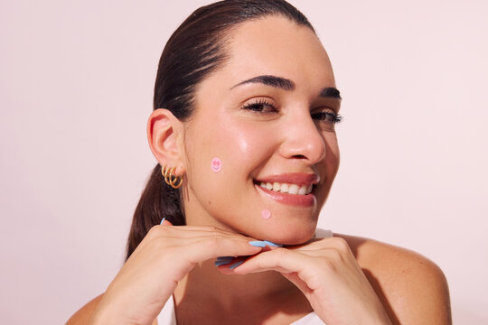 Using Skincare Products at Home With Smile on Face