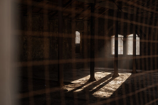 Sunlight Entering Dark Abandoned Industrial Building
