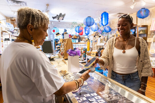 Small Business Customer Mobile pay at retail store