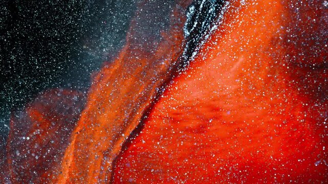 Abstract Orange Ink Flow Creating Layered Fluid Motion with Fine Particle Texture 4K