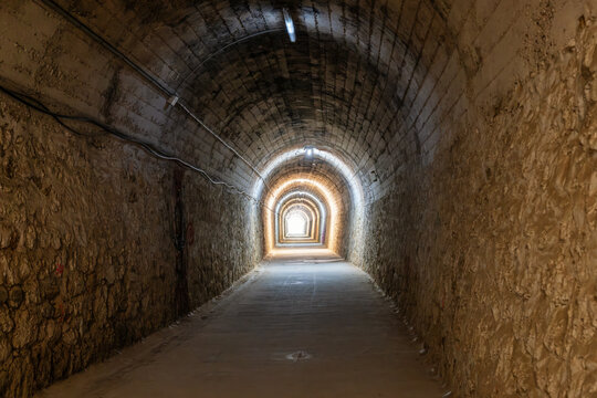Originally built as a narrow-guage railway tunnel in 1947 the 650m tunnel beneath the village of Arnedillo is part of the Via Verde de Cidacos and connects the nearby thermal pools to the village