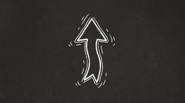 Hand drawn white chalk arrow pointing upwards on a textured dark black chalkboard background surface graphic
