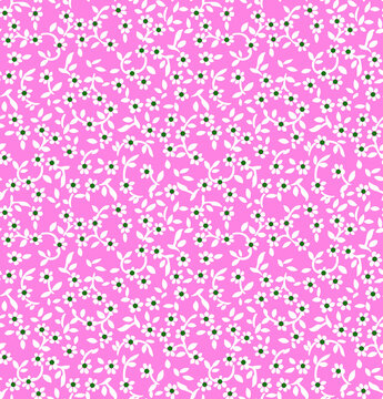 Close-up of pink floral pattern fabric with small white and black flowers