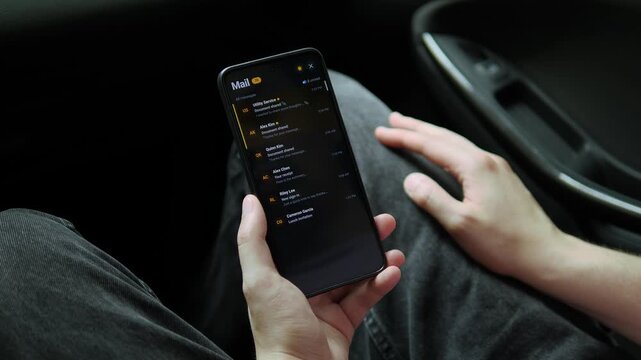 User checks a crowded mobile inbox filled with shared files, receipts and invitations, highlighting digital overload and the pressure to manage constant communication.