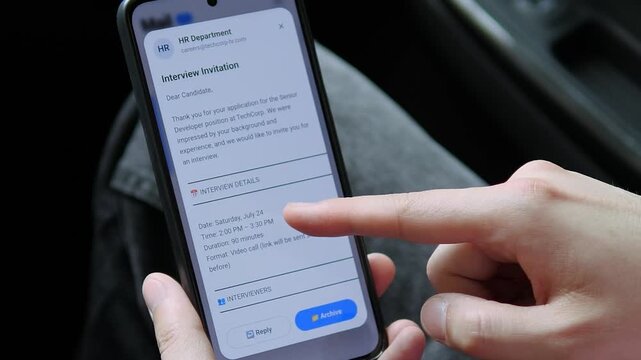 Job seeker opens a mobile interview invitation, capturing digital recruitment, remote hiring and the career-changing moment when an application moves forward.
