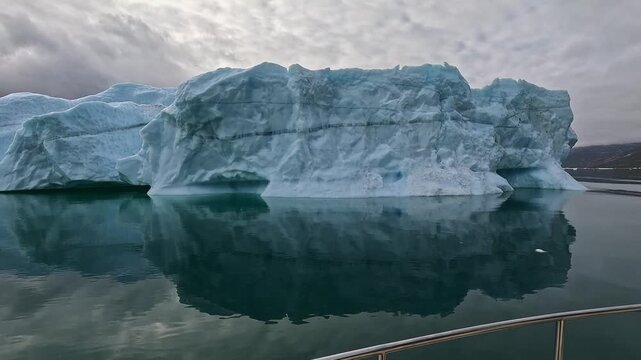 Floating iceberg in the Nuuk fjords, Greenland. Melting ice as result of global warming and climate change.