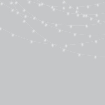 PNG.Festive string lights border with glowing bulbs and empty copy space for Christmas cards, party posters and promotions