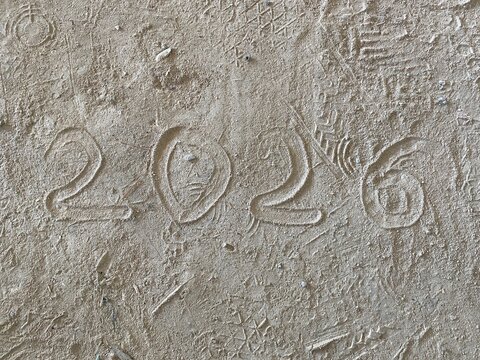 Year 2026 Inscribed in Layer of Dust