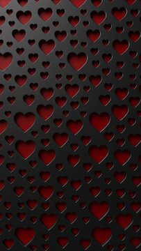 Black metal sheet with laser cut heart pattern over red background