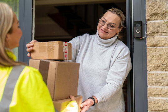 Delivery of packages to a customer at their home during the day
