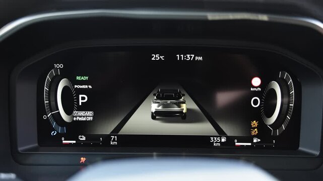 Modern automotive display with digital instruments and lane graphics, representing driver assistance, vehicle monitoring and intelligent driving technology.