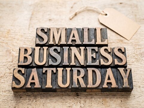 Small Business Saturday promotion with wooden block letters and tag