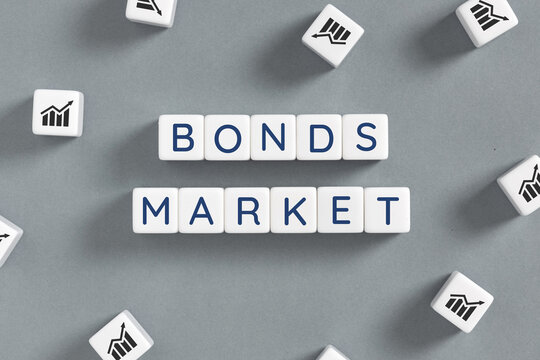 bonds market text on white blocks surrounded by financial graph cubes