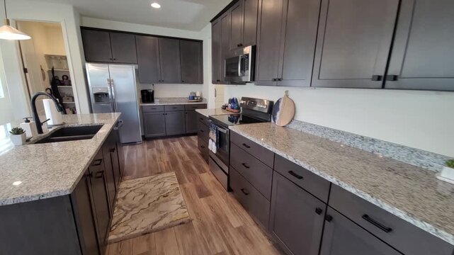 Bright Modern Kitchen with Island and Stainless Appliances