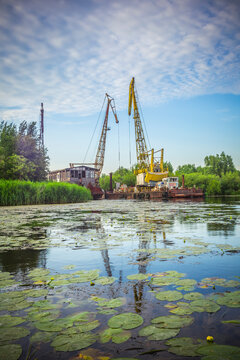 Novaya Pregolya river in Konigsberg abandoned harbor river cranes