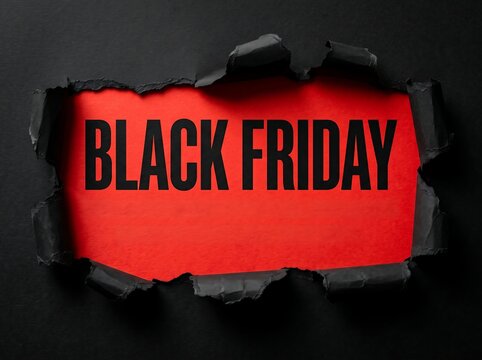 Dramatic black friday sale announcement breaking through a dark background