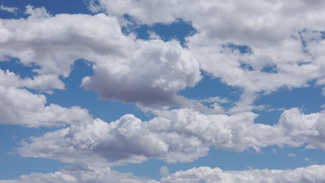 Blue Sky and Puffy Clouds Timelapse Background Zoom Out