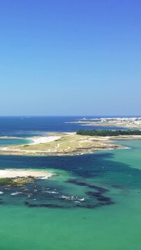 Vertical 9:16 aerial footage showing the Pointe du Conguel and Ilot de Toul Bihan at Quiberon, Brittany, France.