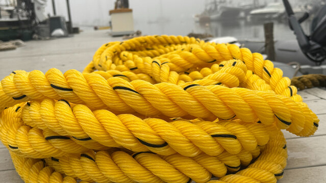 Coiled Yellow Rope On Dock Up Close