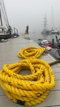 Bright Yellow Marine Rope on Dock in Vertical Format