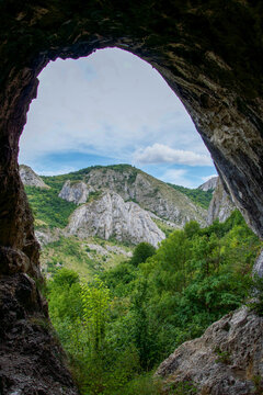 mountain landscape with blue sky, Puculea Cave, Valisoara Gorges, Trascau Mountains, Romania 