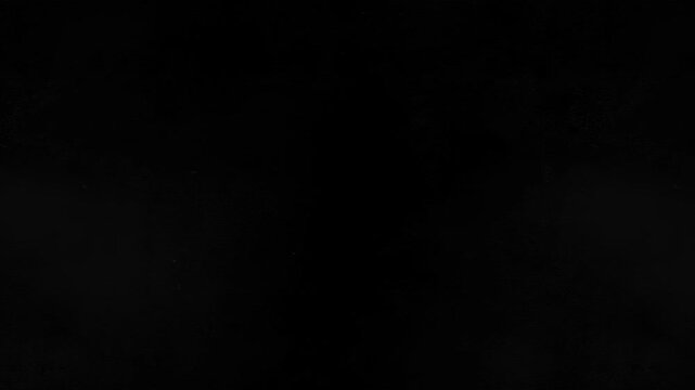 Abstract white dust particles floating in dark background overlay