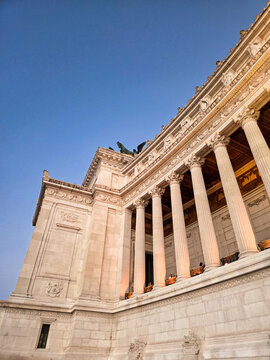 Illuminated Marble Colonnade and Quadriga at Victor Emmanuel II Monument at Dusk, Rome, Italy