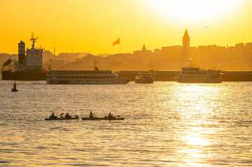 Fototapeta premium Golden sun sets over calm waters