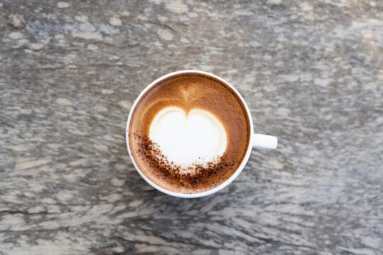 cappuccino on dark old grunge with top view