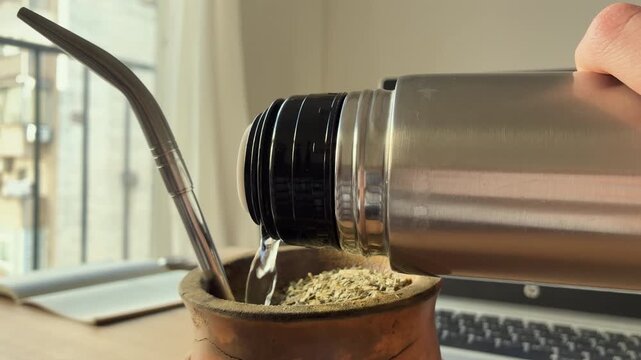 Argentine Yerba Mate Tea and Thermos. Latinamerican Tradition. Typical social drink from Argentina, Uruguay, Paraguay and Brazil. South America Custom, heritage