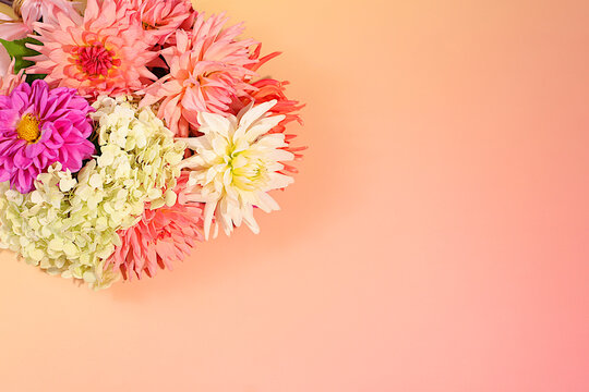 Autumn sunny banner with bouquet of dahlias, abstract floral arrangement and autumn still life with beautiful flowers, background and template for the screen,minimalist holiday concept,greeting card