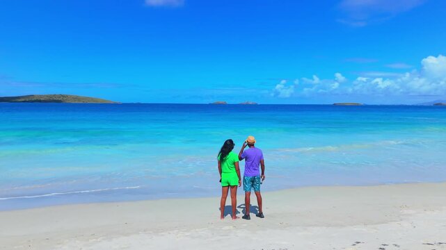 Cinematic Aerial Drone Flyby Over of a couple at Zoni Beach, Culebra