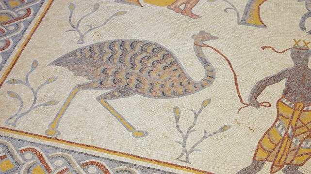 Sixth-century Byzantine floor mosaic showing cultural figures in the Diakonikon Baptistery at the Memorial Church of Moses, Mount Nebo near Madaba, Jordan, close-up panning view