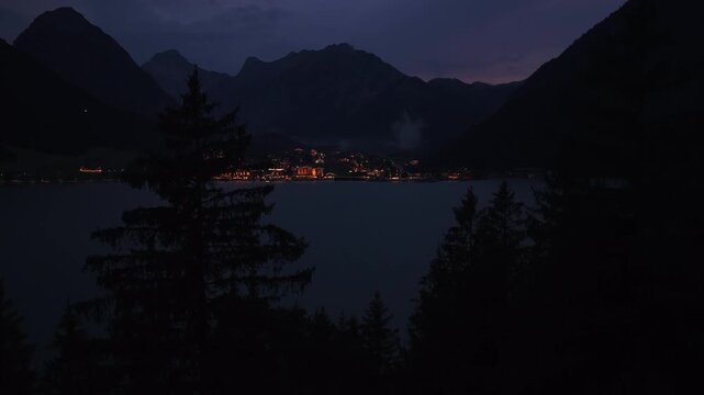 Aerial Night Flight Illuminated Lakeside Town Lake Achensee Tyrol Austria Mountain Silhouette