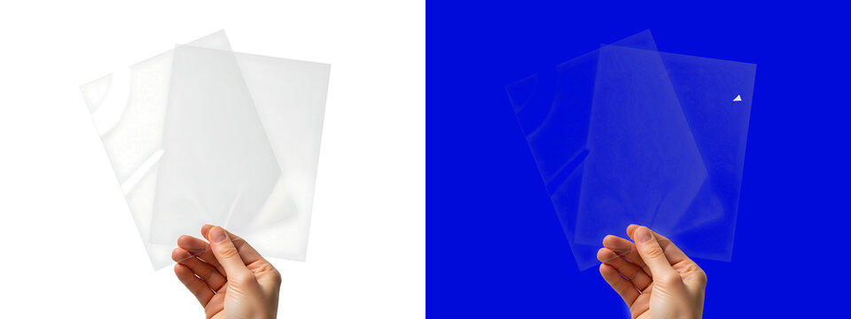 Human hand holding a transparent plastic sheet with a decorative pattern, isolated on a white background, for overlay and, texture projects isolated on a transparent background