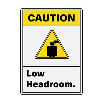 Caution low headroom sign with a person hitting their head on a ceiling obstacle