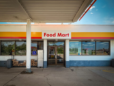 Lebanon, Illinois, USA - June 9, 2026: Exterior storefront and fuel canopy of a Shell gas station Food Mart convenience store along a travel route. Located in Southern Illinois, USA.