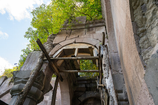 A stone arch in ruins