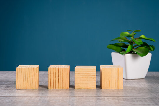 wooden cubes placed on a wooden surface